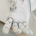 Robot hand extended — the cost of a custom AI chatbot