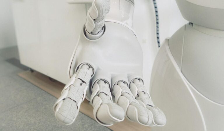 Robot hand extended — the cost of a custom AI chatbot