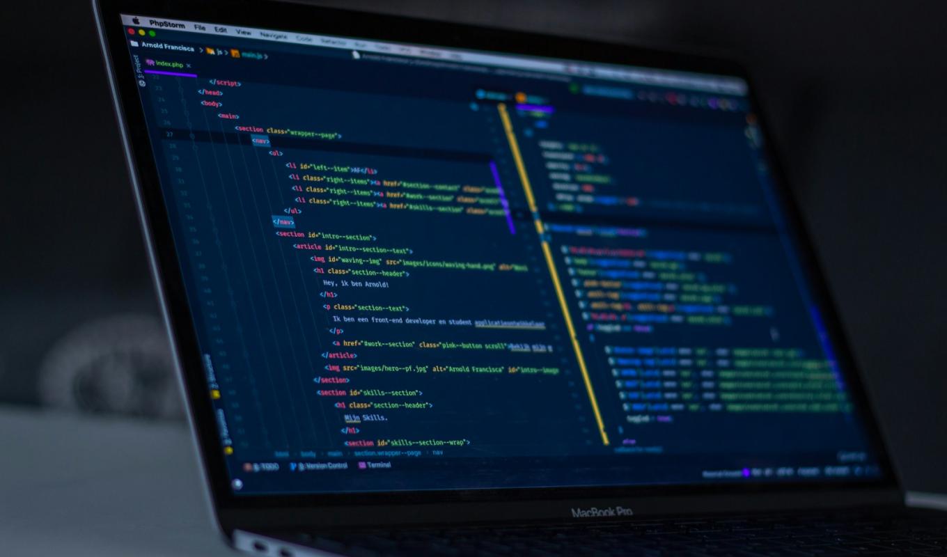 Code on a laptop screen — setting up a self-hosted n8n server