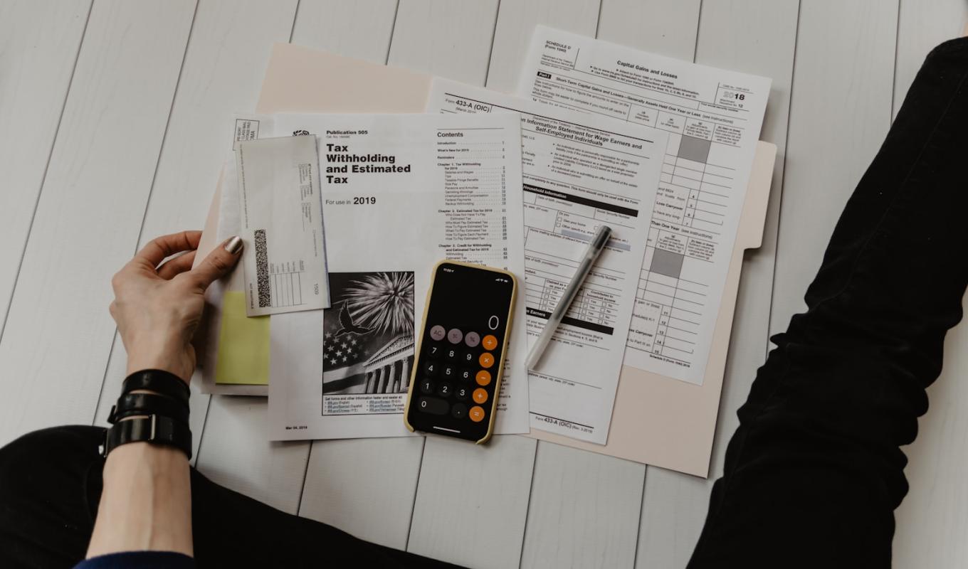 Calculator and paperwork — working out what automation costs